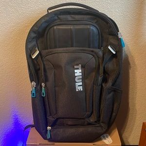 Thule backpack black with white dots